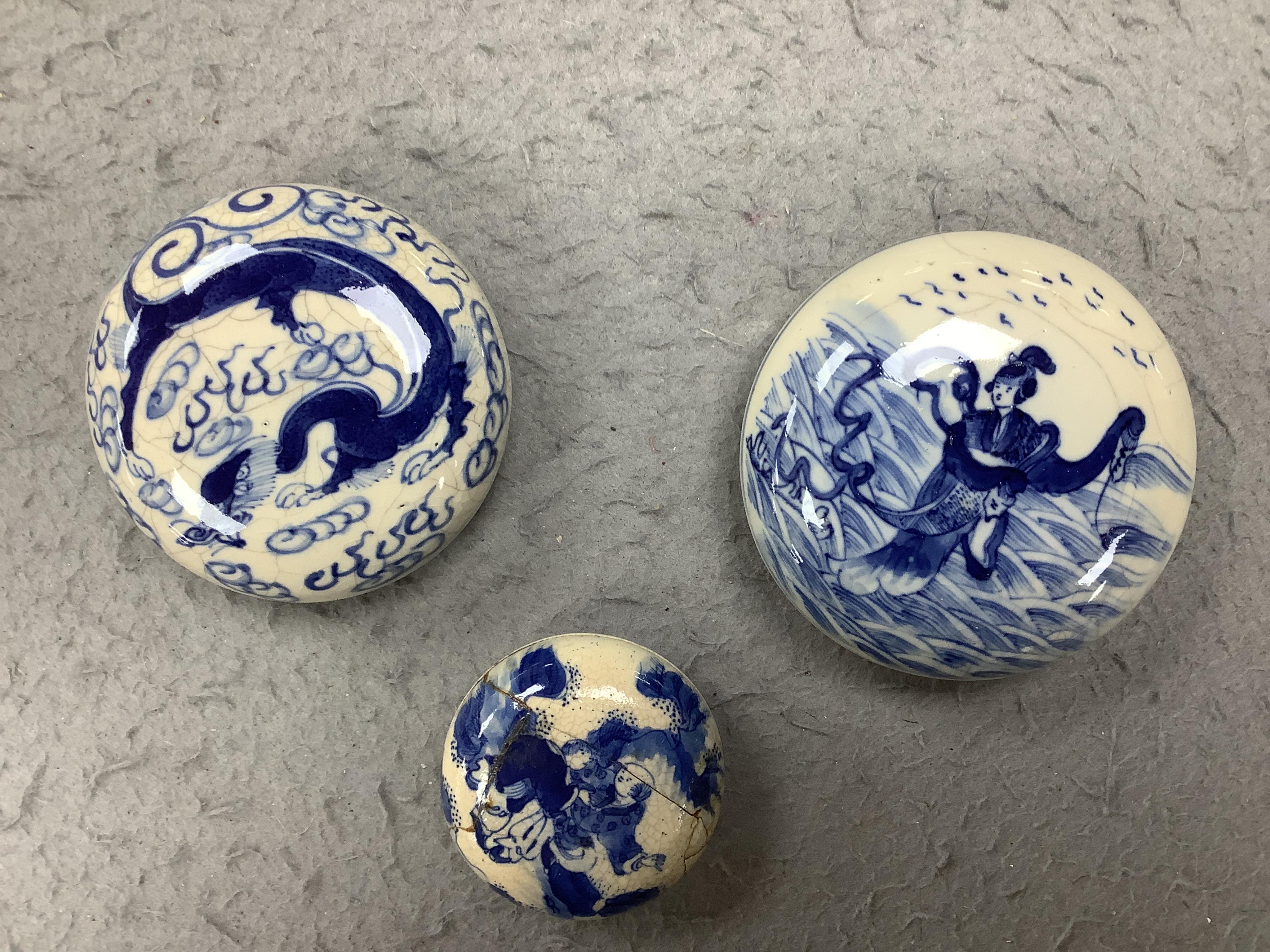 A Japanese eggshell tea and coffee set and three Chinese blue and white seal paste boxes and covers